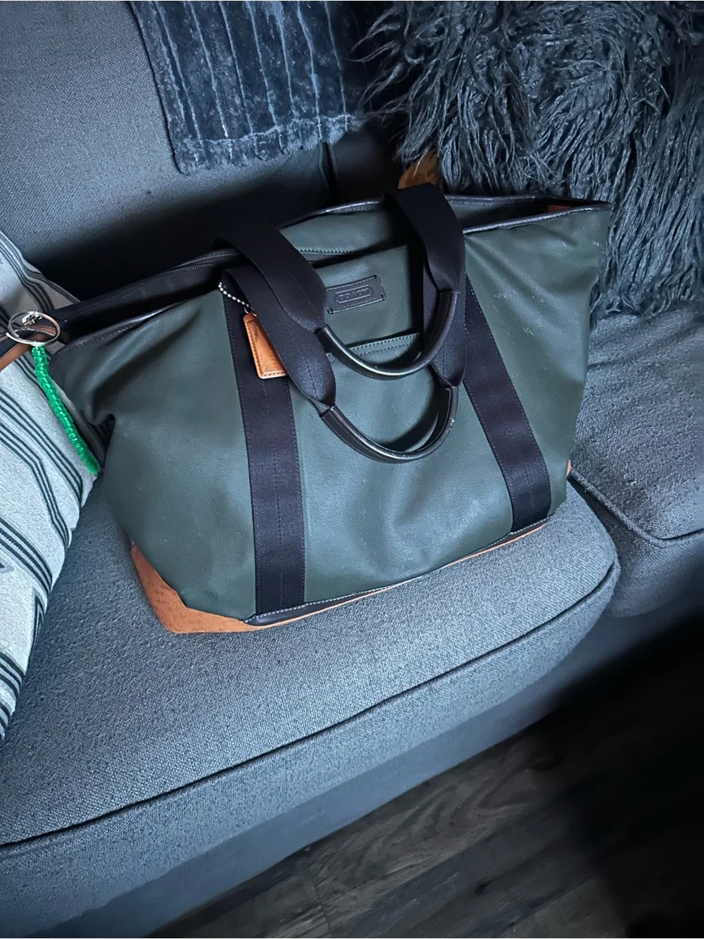 Coach Olive Green Duffel Bag with Black Straps and Tan Accents